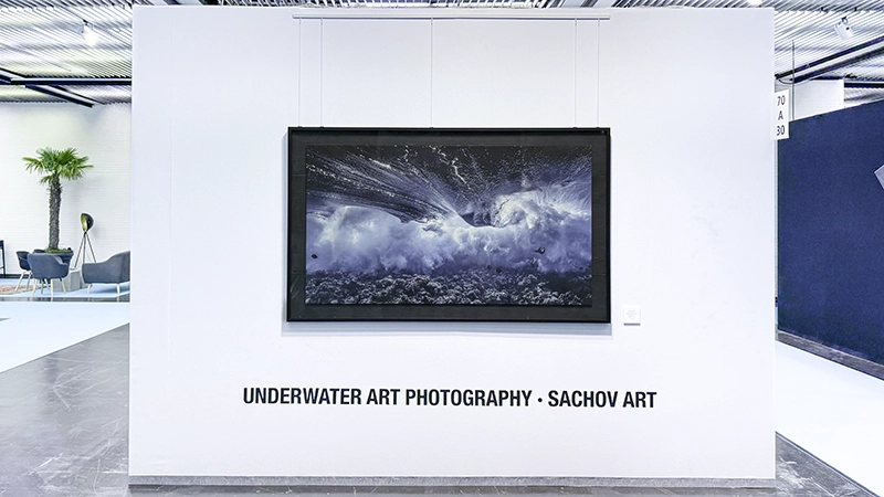 Booth exterior at boot Dusseldorf 2026 with Mixed Emotions / Storm, 180 x 101 cm, the largest work on view