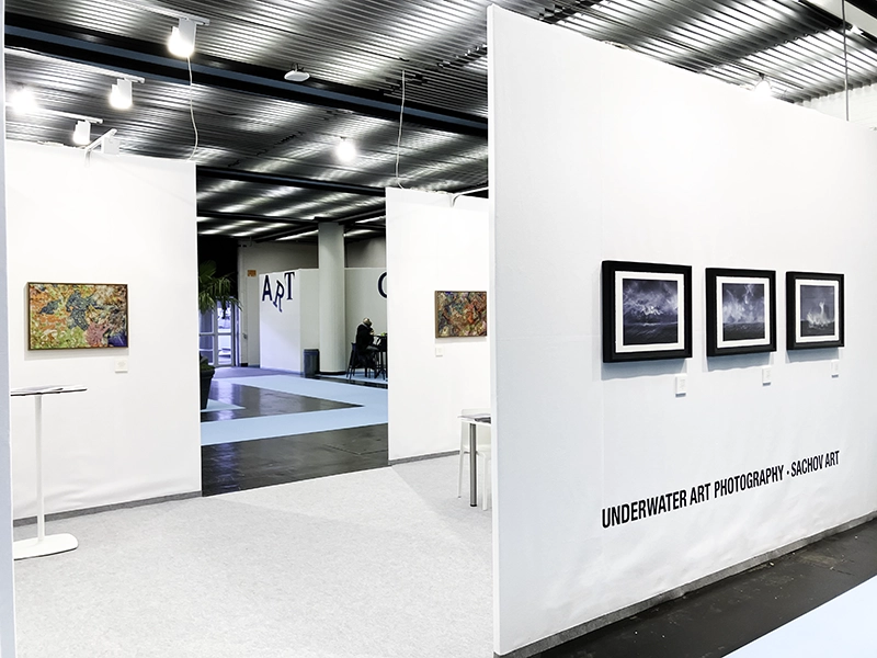 Booth exterior showing The Jewel of Nature #7, The Jewel of Nature #6, and three works from The Edge series within the Maritime Art / Galeria boot area