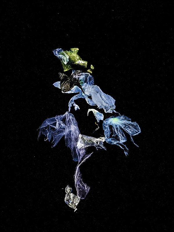 Alexej Sachov, The Ballerina (2023), from Chronicles of an Emerging Diversity. Sculptural marine debris figure photographed underwater with strobe illumination.